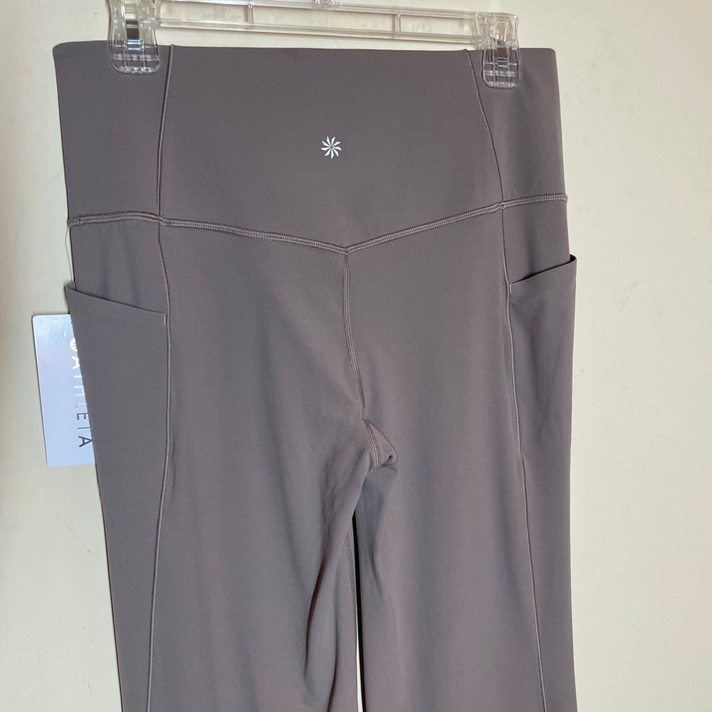 NWT Athleta Salutation Stash Flare Pant. Large - Picture 4 of 10